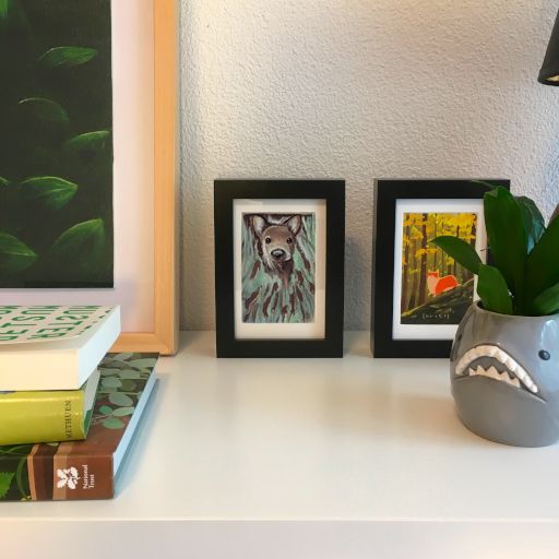 Photo of an inpainted picture frame on a book shelf